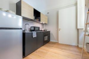 Kuchyňa alebo kuchynka v ubytovaní Top Living Apartments - Torino Centro