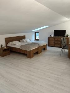 Posteľ alebo postele v izbe v ubytovaní Domek Mazury Harsz