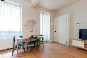 Televízia a/alebo spoločenská miestnosť v ubytovaní Top Living Apartments - Torino Centro