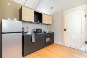 Kuchyňa alebo kuchynka v ubytovaní Top Living Apartments - Torino Centro