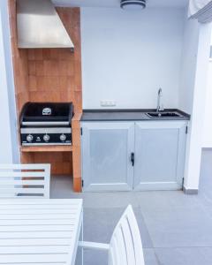 Kuchyňa alebo kuchynka v ubytovaní Apartamento Ático Estrasburgo suites