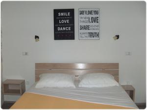 Postel nebo postele na pokoji v ubytování Apartments Mila