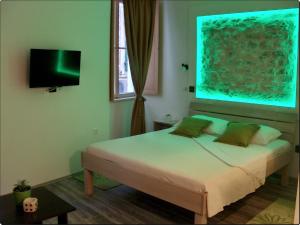 Postel nebo postele na pokoji v ubytování Apartments Mila