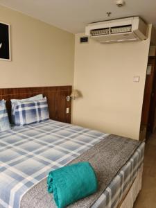 Uma cama ou camas num quarto em Flat maravilhoso no Centro de Taguatinga - Pistão Sul