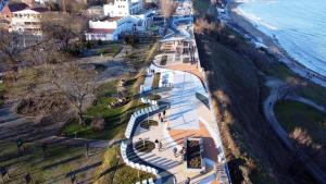 an aerial view of a park next to the ocean at Iris&carina in Eforie Sud