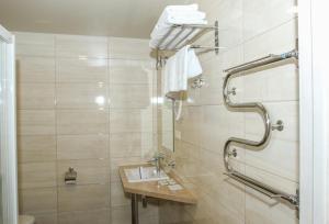 Ванная комната в Hotel Lubenska Sloboda