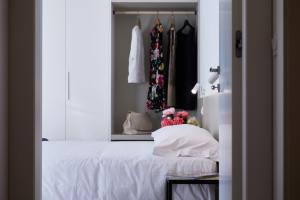 A bed or beds in a room at Residenza Ai Ferrari