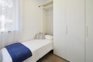 A bed or beds in a room at Residenza Ai Ferrari