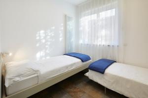 A bed or beds in a room at Residenza Ai Ferrari