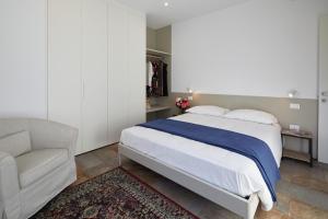 A bed or beds in a room at Residenza Ai Ferrari