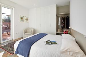 A bed or beds in a room at Residenza Ai Ferrari