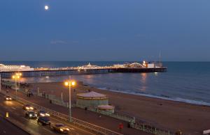 a view of a pier with traffic on the beach at The Old Ship Hotel in Brighton & Hove
