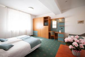 Voodi või voodid majutusasutuse Albergo San Carlo toas