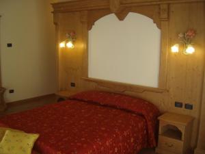 Cama o camas de una habitación en Albergo Miramonti Dependance