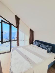 Letto o letti in una camera di Gudauri Travel Chalets in New Gudauri