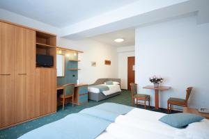 Voodi või voodid majutusasutuse Albergo San Carlo toas