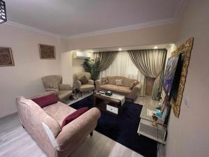 Et opholdsområde på Shehab Royal Apart-Hotel 4