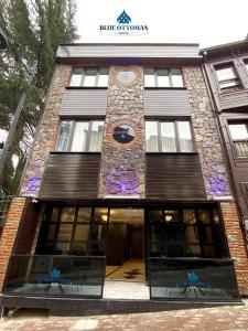 a building with a clock on the front of it at Hotel Blue Ottoman in Istanbul