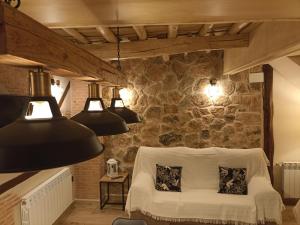 Łóżko lub łóżka w pokoju w obiekcie El Cascanueces - Casa Rural