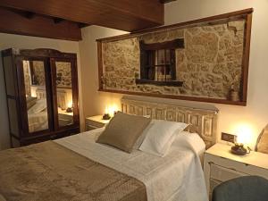 เตียงในห้องที่ El Cascanueces - Casa Rural