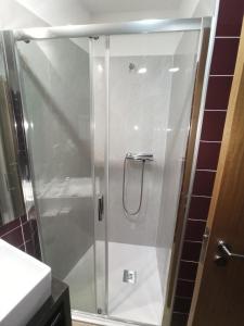 Ein Badezimmer in der Unterkunft Hotel Vila Luena