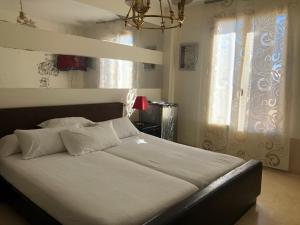 Giường trong phòng chung tại VILLA BONITA