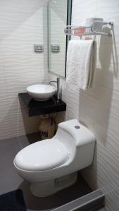 Ванна кімната в Hospedaje Dimar Inn