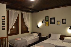 Katil atau katil-katil dalam bilik di Yakusha - Якуша, къща за гости