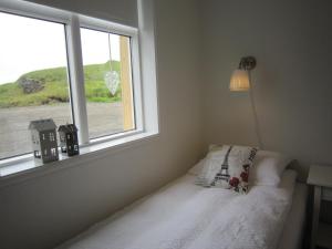Voodi või voodid majutusasutuse Apartment by the Sea toas
