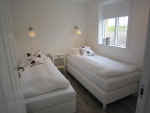 Voodi või voodid majutusasutuse Apartment by the Sea toas