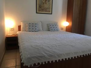 Postel nebo postele na pokoji v ubytování Apartment Lucia