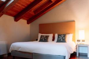 Postel nebo postele na pokoji v ubytování Savoia Resort