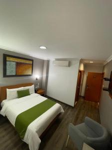 Katil atau katil-katil dalam bilik di Hotel Plaza Monte Carlo