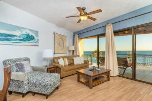 a living room with a view of the ocean at Rocky Point Sonoran Resorts in Puerto Peñasco