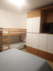 A bed or beds in a room at Green Garden