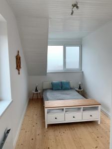 Posteľ alebo postele v izbe v ubytovaní Tihany Panorama House