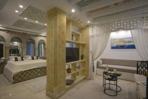 TV a/nebo společenská místnost v ubytování Dar Hammamet Guest House & Hammam