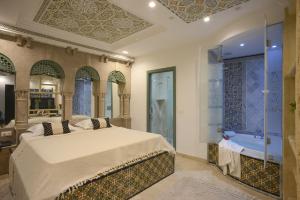 Postel nebo postele na pokoji v ubytování Dar Hammamet Guest House & Hammam