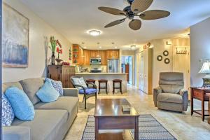 a living room with a couch and a table at Kihei Condo Steps to Kalepolepo Beach Park! in Kihei