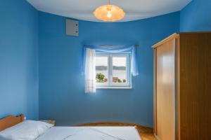 Postel nebo postele na pokoji v ubytování Apartments Vese - 100 m from beach