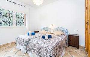 Posteľ alebo postele v izbe v ubytovaní 3 Bedroom Awesome Home In Porto Petro