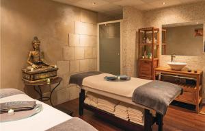 a hospital room with two beds and a sink at Le Domaine De Fayence in Fayence