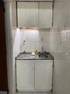 Kuchyň nebo kuchyňský kout v ubytování Portillo Apartments