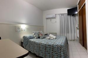 Postel nebo postele na pokoji v ubytování Portillo Apartments
