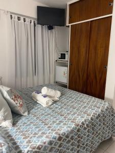 Postel nebo postele na pokoji v ubytování Portillo Apartments