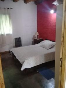 Кровать или кровати в номере Casa en Luján de Cuyo con pileta