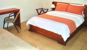 Katil atau katil-katil dalam bilik di Hotel Madrigal