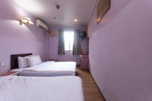 Cama o camas de una habitación en OYO 89625 Bilton Inn