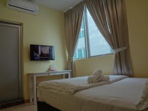 Afbeelding uit fotogalerij van Comma Hotel in Bandar Saujana Putra
