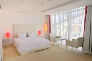 Ecograd Hotel客房内的一张或多张床位